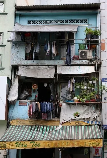 modern compact Vietnamese apartment interior with smart storage solutions and natural light