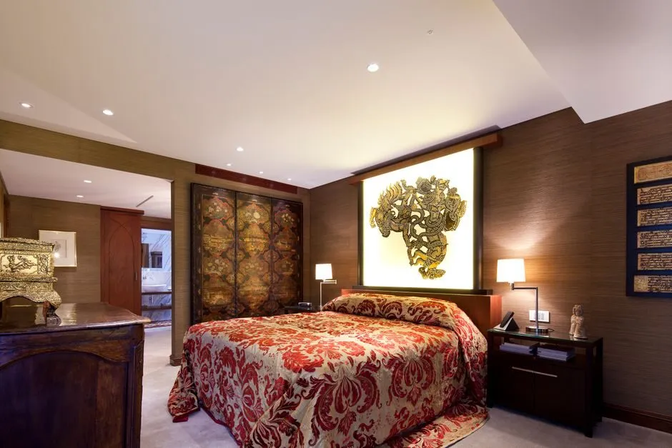 modern luxury master bedroom with large bed and elegant furniture