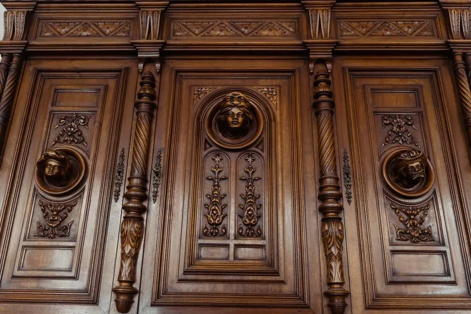 ornate neoclassical furniture with carved details and gold accents