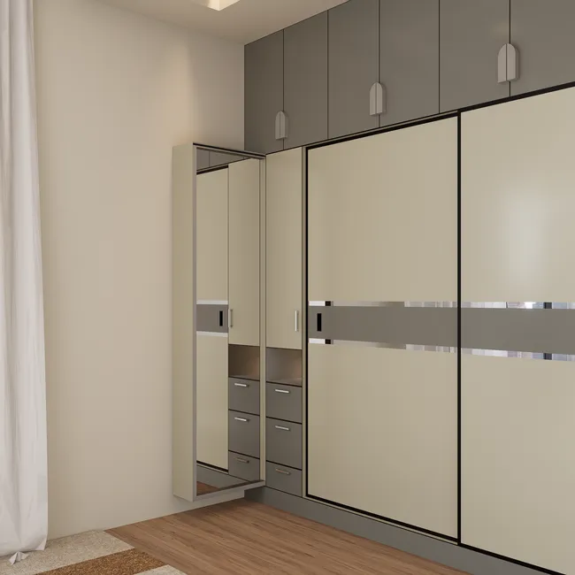 sliding wardrobe doors with mirror panels in compact bedroom