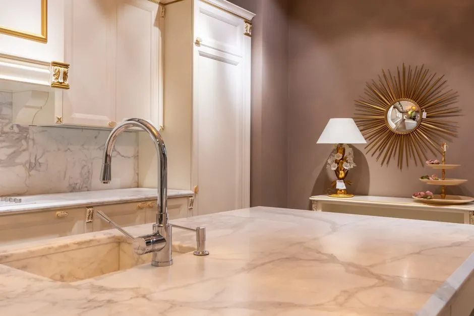 luxury kitchen counter with white quartz stone and modern fixtures
