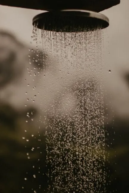 modern rainfall shower head with digital temperature display