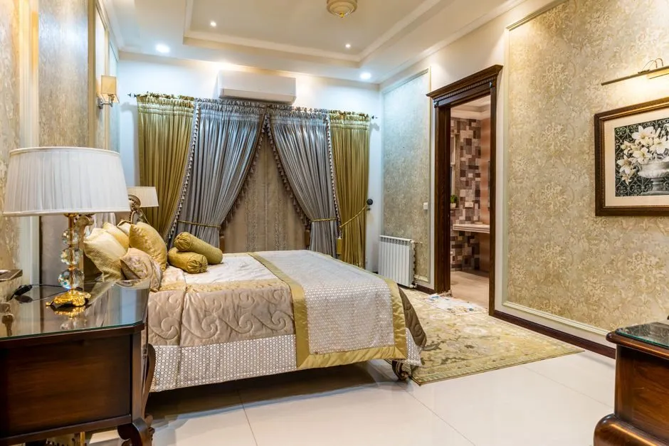 elegant white and gold bedroom interior with metallic accents